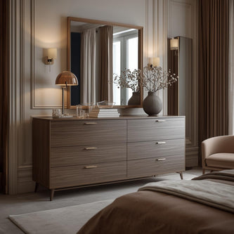 A bedroom dresser with drawers and a wardrobe beside it.